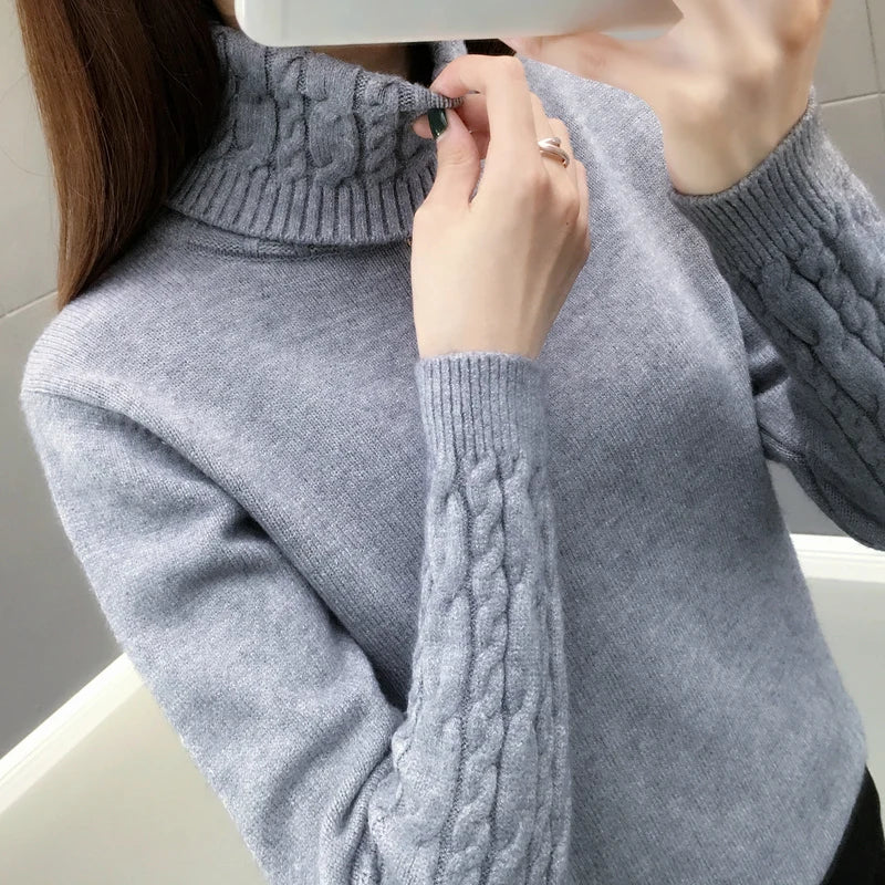 Pull col roulé femme