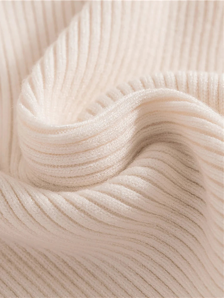 Pull col roulé femme