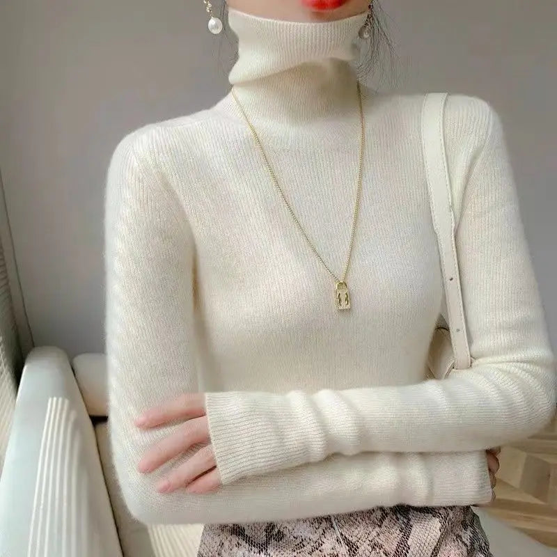 Pull col roulé femme