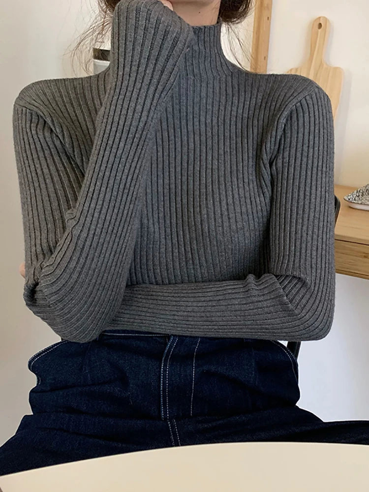 Pull col montant femme