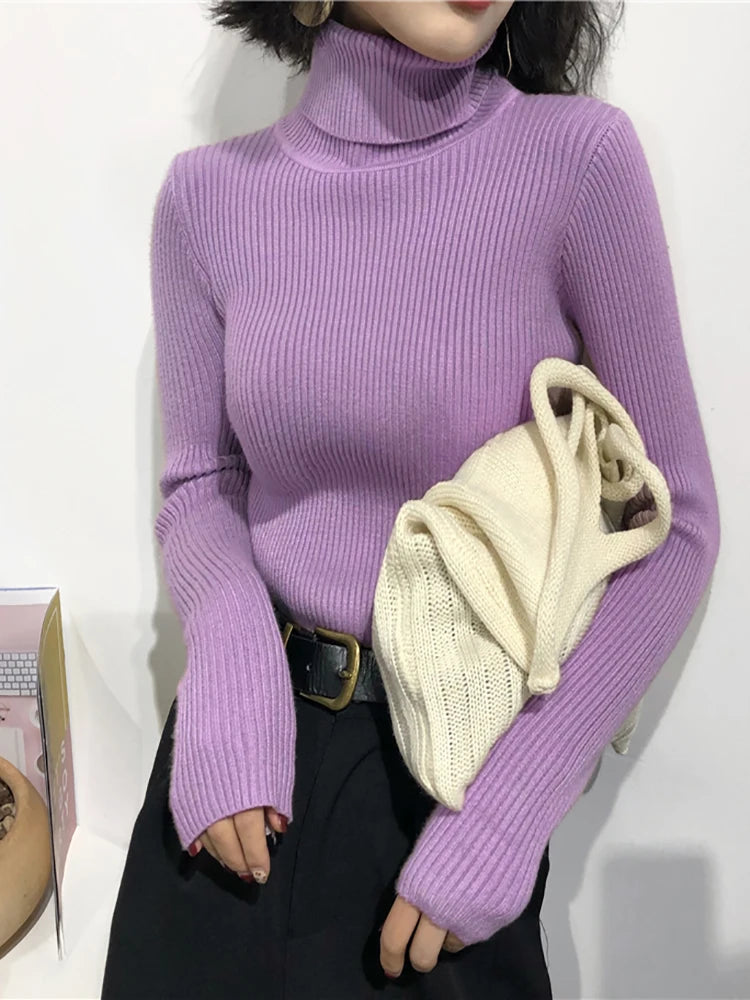 Pull col roulé femme
