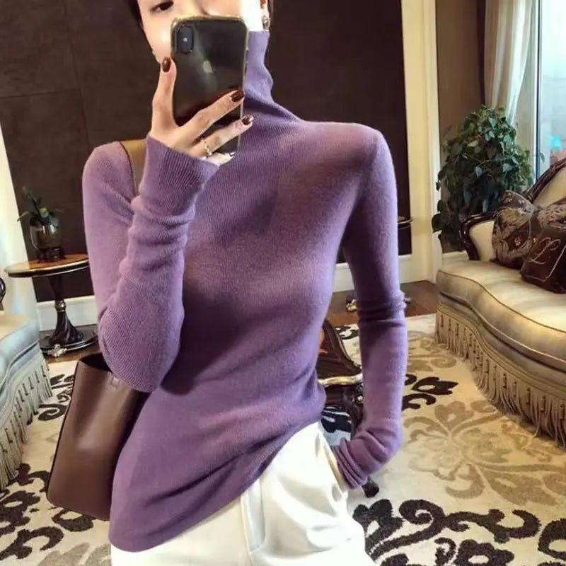 Pull col roulé femme