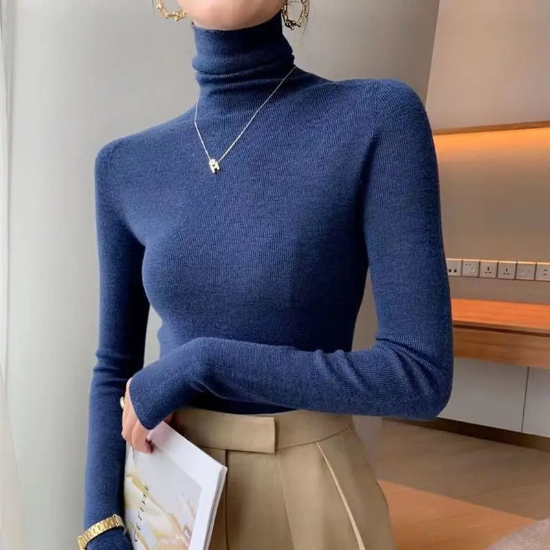 Pull col roulé femme