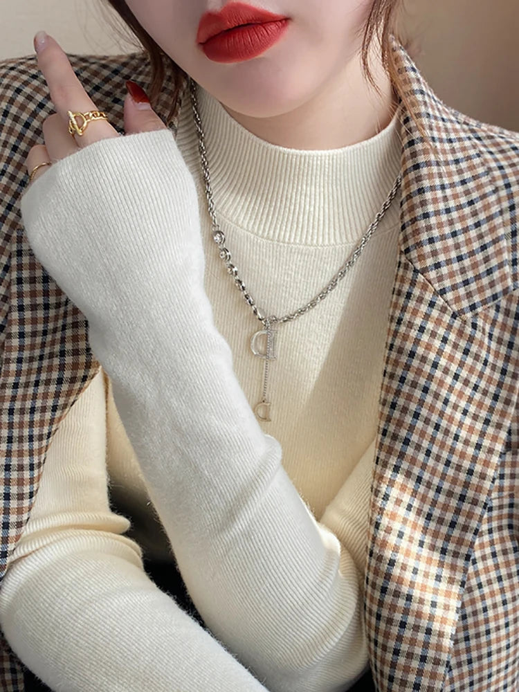 Pull col montant femme