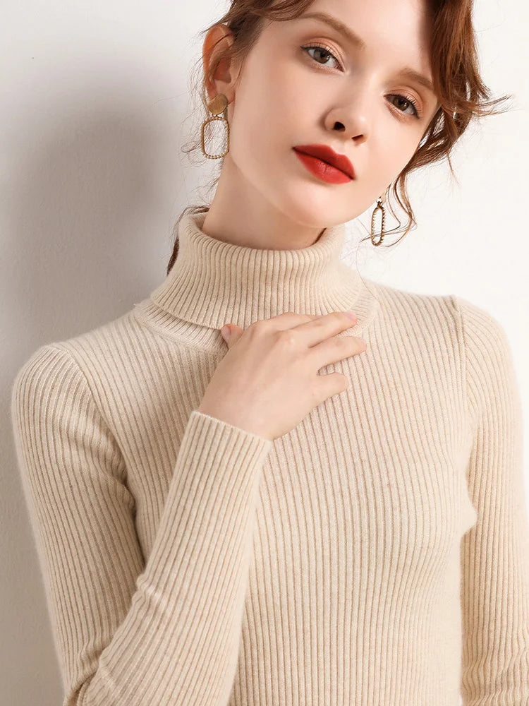 Pull col roulé femme