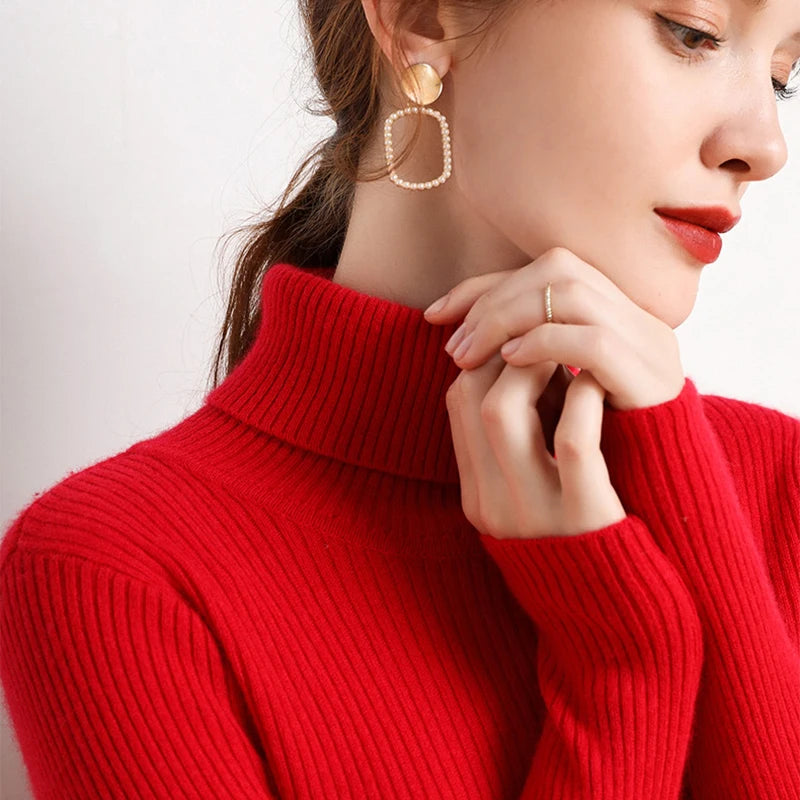 Pull col roulé femme