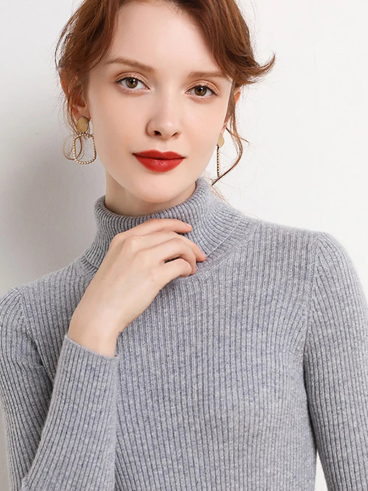 Pull col roulé femme