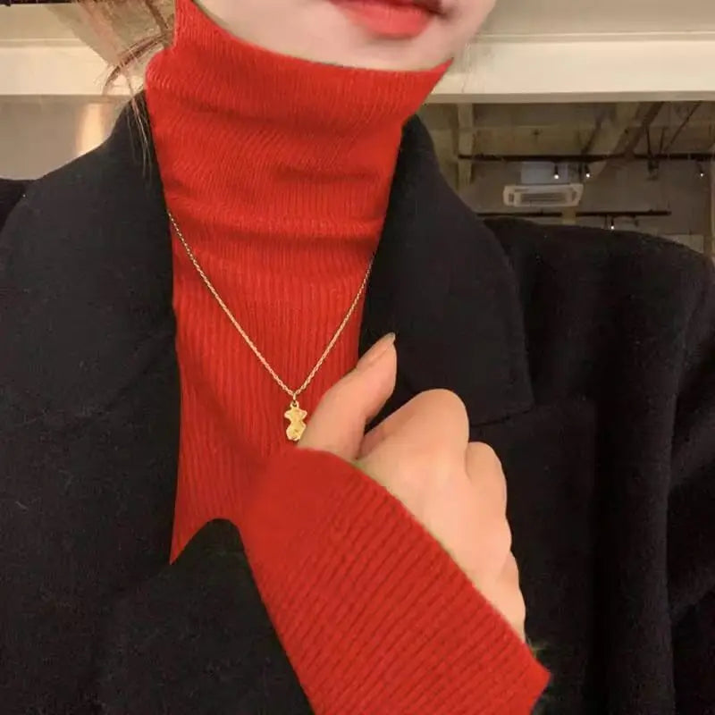 Pull col roulé femme