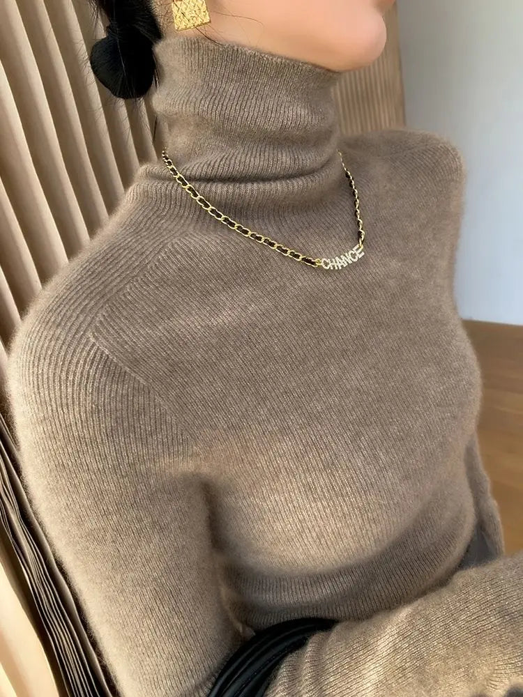 Pull col roulé femme