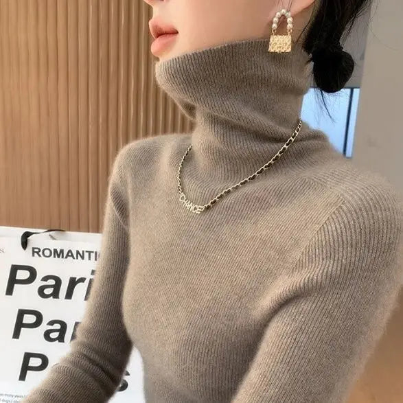 Pull col roulé femme