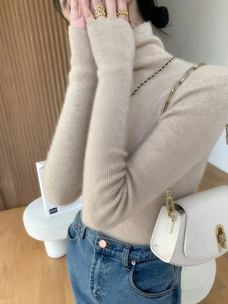 Pull col roulé femme