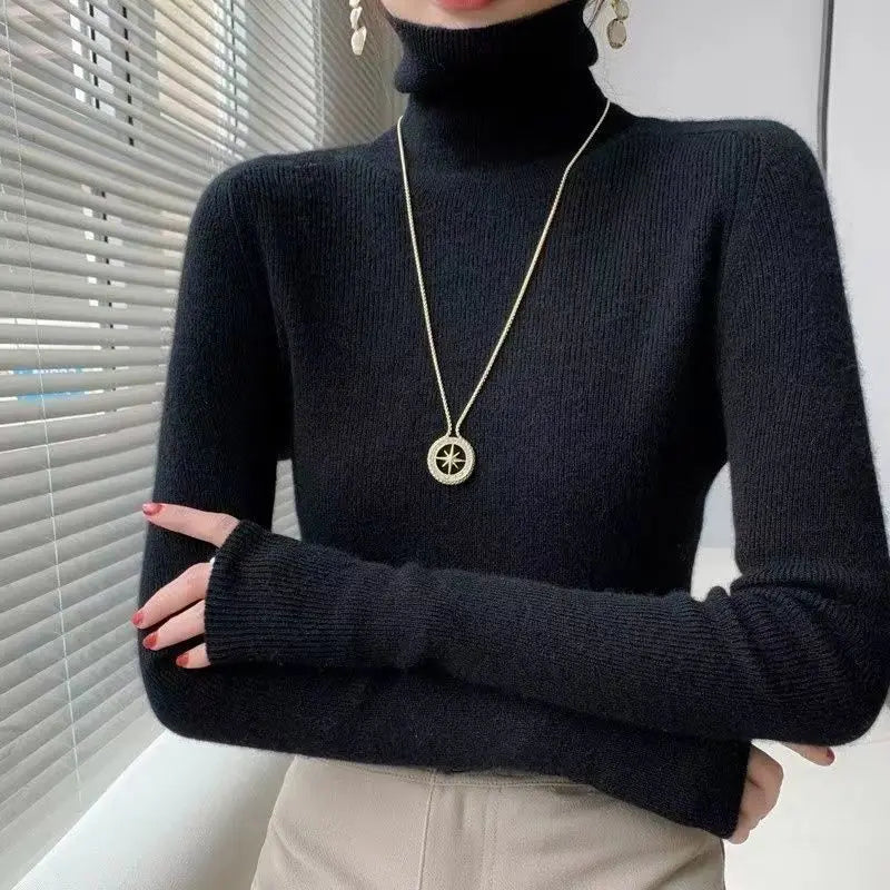 Pull col roulé femme